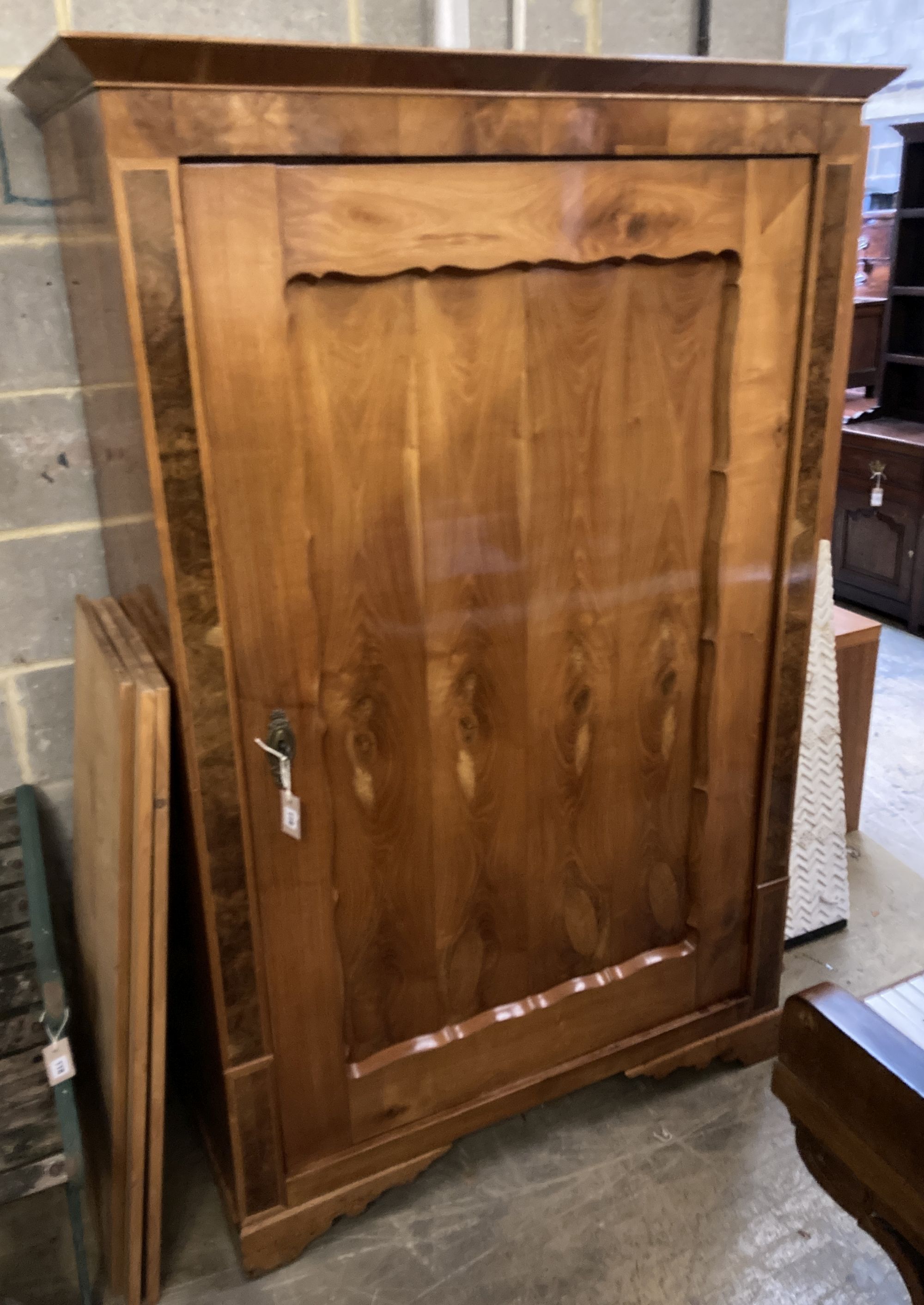 A 19th century Continental cherry armoire, width 118cm, depth 54cm, height 180cm